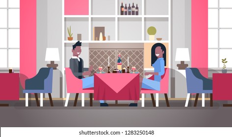 couple sitting cafe table romantic dinner happy valentines day celebration concept african american man woman love dating modern restaurant interior horizontal flat