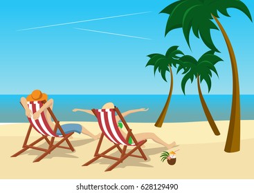 Couple Sitting In Deck Chairs On Beach At Tropical Resort