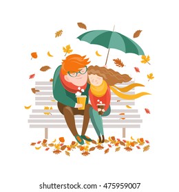 Couple sitting on bench under umbrella