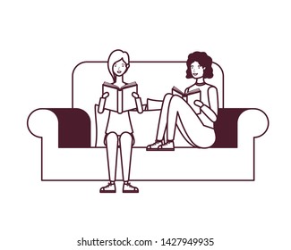 couple sitting on chair with book in hands
