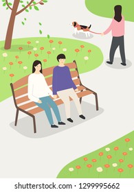 Couple sitting on a park bench.