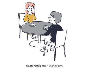 Una pareja sentada en una mesa y conversando Scenery en una cafetería o cafetería

