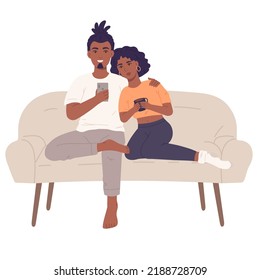Couple sitting together on sofa and wathcing smartphone. Lovers spending time together.