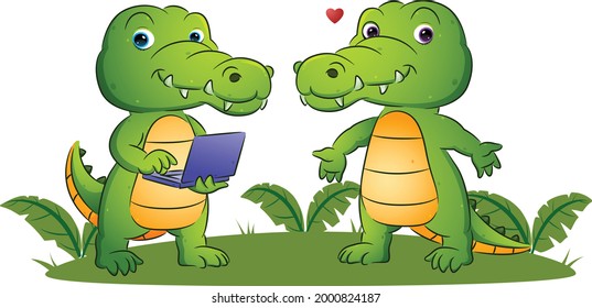 The couple of the smart crocodile is holding the new laptop in the garden of illustration