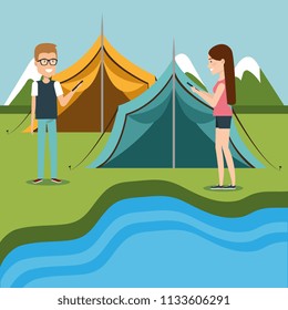 couple with smartphones in the camping zone