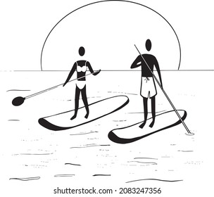 Couple stand up paddleboarding (SUP) on ocean or lake in the sunset