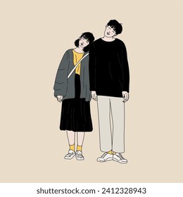 a couple standing taking a photo