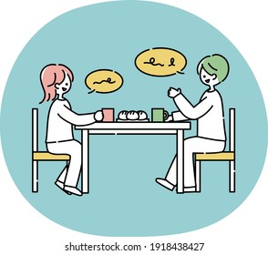 A couple talking at a dining table