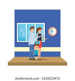 couple teachers with boy in the classroom