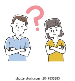 A couple with their arms folded and wondering