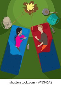 A couple in their sleeping bags while camping.