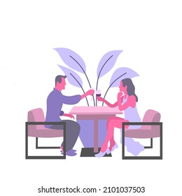 Una pareja está comiendo en un restaurante
