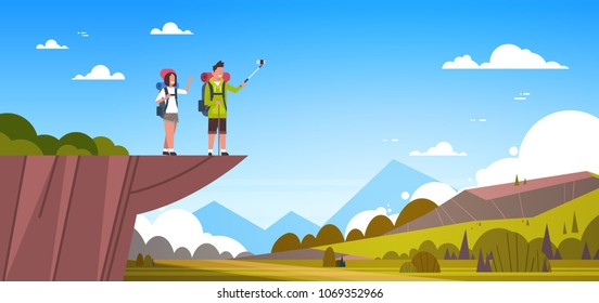 Couple Of Tourists With Backpacks Taking Selfie Over Beautiful Nature Landscape Background Man And Woman Hiking