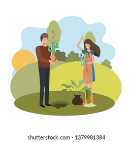 couple with trees to plant in landscape