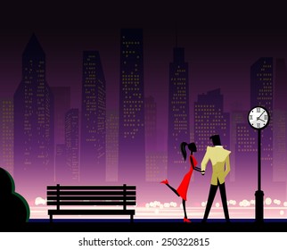 Couple under the clock in city park