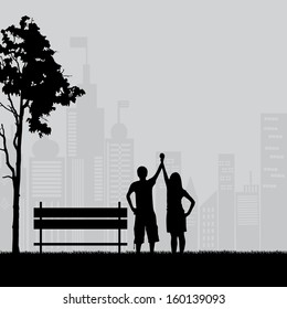 Couple under the tree in city park