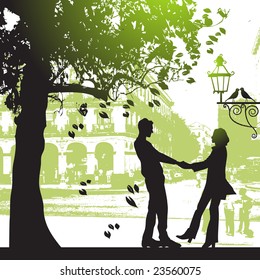 Couple under the tree in city park