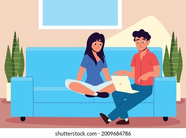 couple using laptop on sofa at home