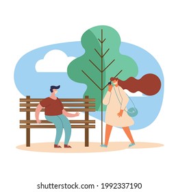 couple using masks in park