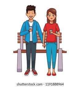 Couple using smartphones on bench
