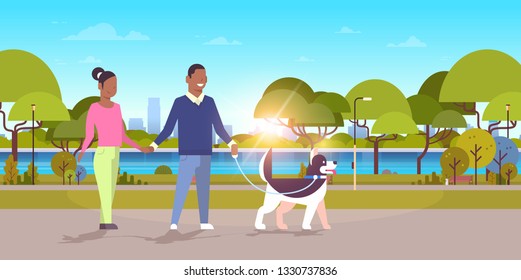 couple walk with husky dog african american man woman walking city urban park sunset landscape background people having rest outdoor flat horizontal full length