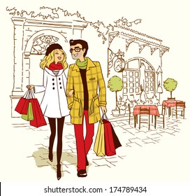 couple walking by cafe