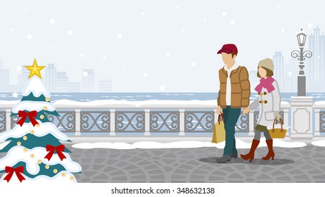 Couple walking in winter town