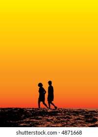 A couple walks the ocean beach at sunset