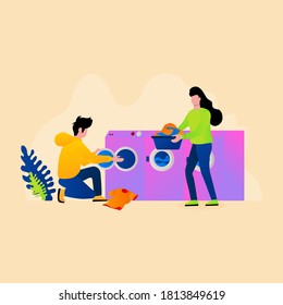 Couple washing clothes in laundry