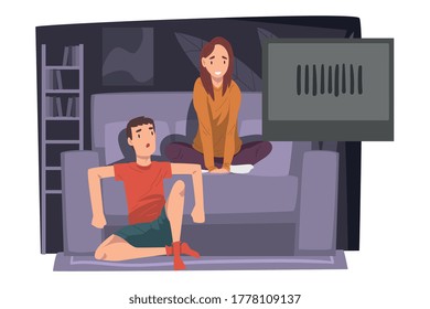 Couple Watching Movie Together on Couch, Young Man and Woman Relaxing at Home Vector Illustration