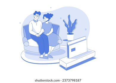 A Couple Watching Tv In The Living Room