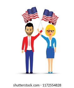 couple waving American flags
