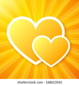Couple of yellow paper hearts on shining vector background