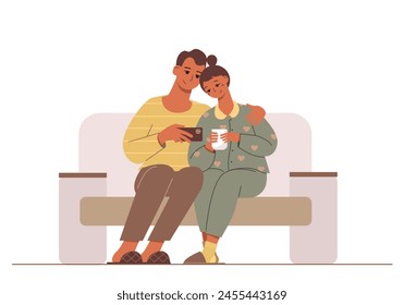 A couple of young people sitting on sofa. Friendly family. A man hugs woman holding a cup of tea. A husband and wife watching video on a phone. Home cozy vector illustration. Warm relations in couple.