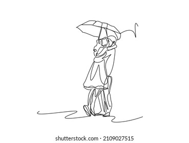 couples in love hugging kissing under umbrella on rainy day