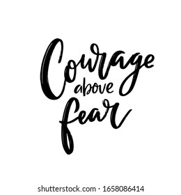 Courage above fear.   Black script handwritten text isolated on white background