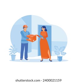 The courier delivers the order box to the customer's address. A woman receives an order box from a delivery person at home. order Confirmation concept. Trend Modern vector flat illustration