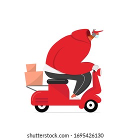 A courier in a medical mask delivers food on a scooter. Coronavirus contactless food delivery quarantine. Safe delivery during a coronavirus pandemic. 