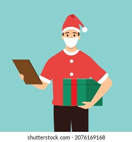 a courier wearing a protective face mask and a Christmas hat. Delivery of new year's gifts during the pandemic and quarantine of coronavirus, covid-19.