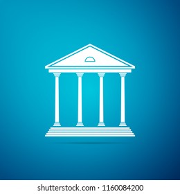 Courthouse building icon isolated on blue background. Building bank or museum. Flat design. Vector Illustration