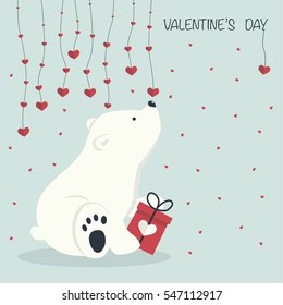 The cover design.Little bear is sitting with the gift box on the blue background with hearts.