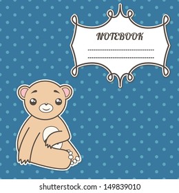 cover notebook with a frame for a name and a smiling bear