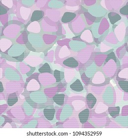 Covered with a transparent network of abstract seamless camouflage. A fashionable hodgepodge of color.