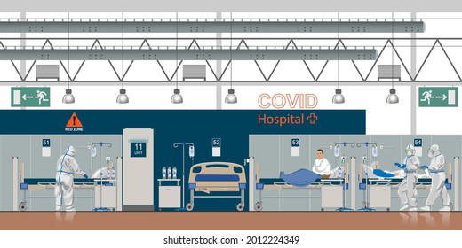 Covid hospital with intensive care units. Admissions to intensive care due to Covid-19. Proffessional doctors and nurses work in a hospital ward in protective suits.