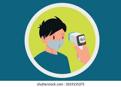 Covid-19 or coronavirus body temperature check is required. Using infrared temperature thermometer on the forehead