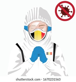 Covid-19 or Coronavirus concept. Belgian medical staff wearing mask in protective clothing and praying for against Covid-19 virus outbreak in Belgium. Belgian man and Belgium flag. Epidemic corona