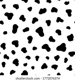 Cow or dalmatian dog skin texture seamless pattern. Black and white spotted background. Animal print design. Vector illustration.	