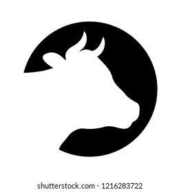 Cow head graphic icon. Cattle symbol. Logo. Cow head white silhouette in the black circle Isolated on white background. Vector illustration