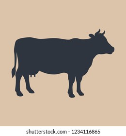 Cow sign. Cow black silhouette Isolated on beige background. Cattle symbol. Vector illustration