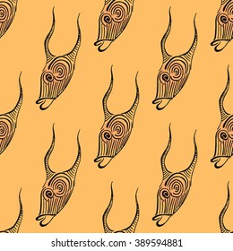 Cow skull isolated on orange background. Seamless pattern. Hand drawn illustration. Boho style. Vector element for your design. 